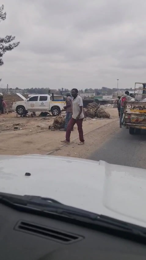 Vehicle documented at an illegal Kya Sand dump site
